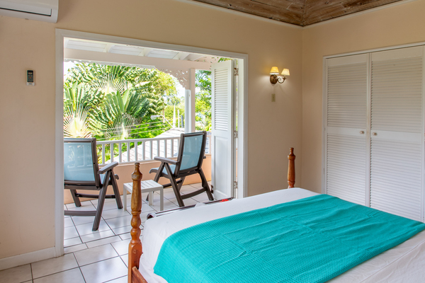 Upstairs Bedroom with Balcony and a view